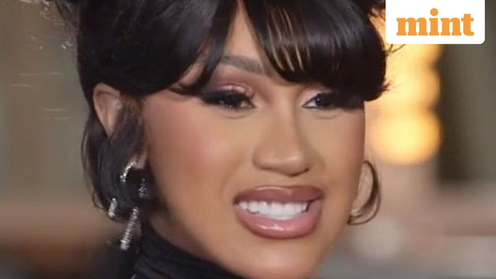 Rapper Cardi B said she feels “powerful” balancing pregnancy, new music, and her upcoming arena tour.