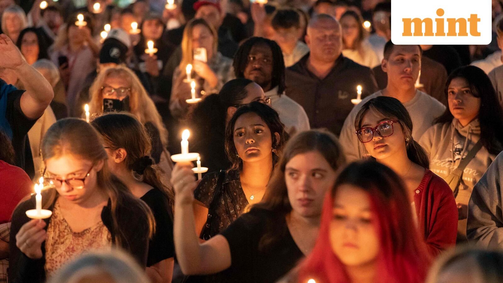 Attendees hold candles during a candlelight vigil and prayer event for Turning Point USA Founder Charlie Kirk on September 10, 2025 in Seattle, Washington. Kirk was shot dead while speaking at Utah Valley University earlier in the day.