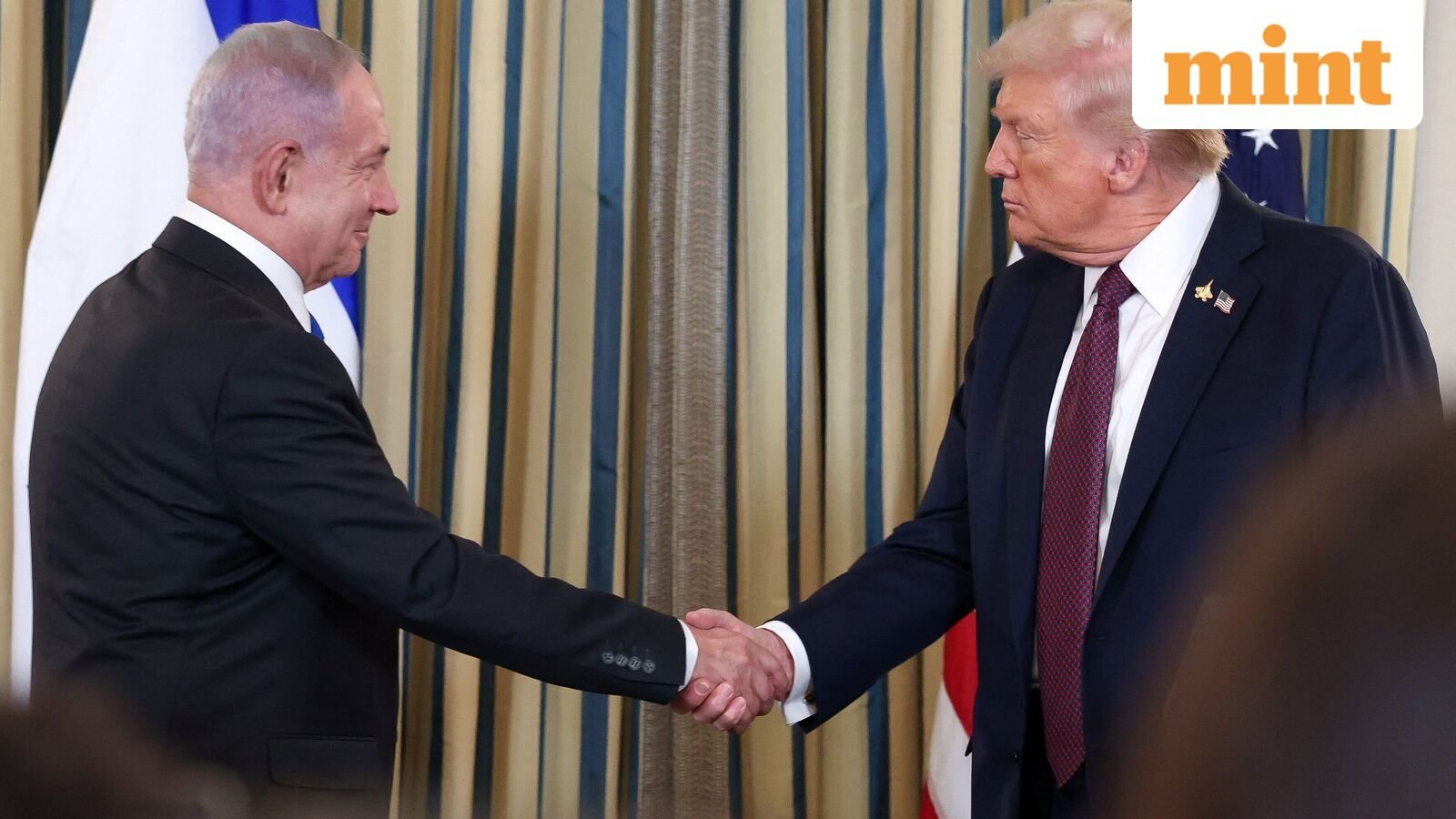 U.S. President Donald Trump and Israeli Prime Minister Benjamin Netanyahu shake hands at a joint press conference in the State Dining Room at the White House in Washington, D.C., U.S., September 29, 2025. REUTERS/Jonathan Ernst