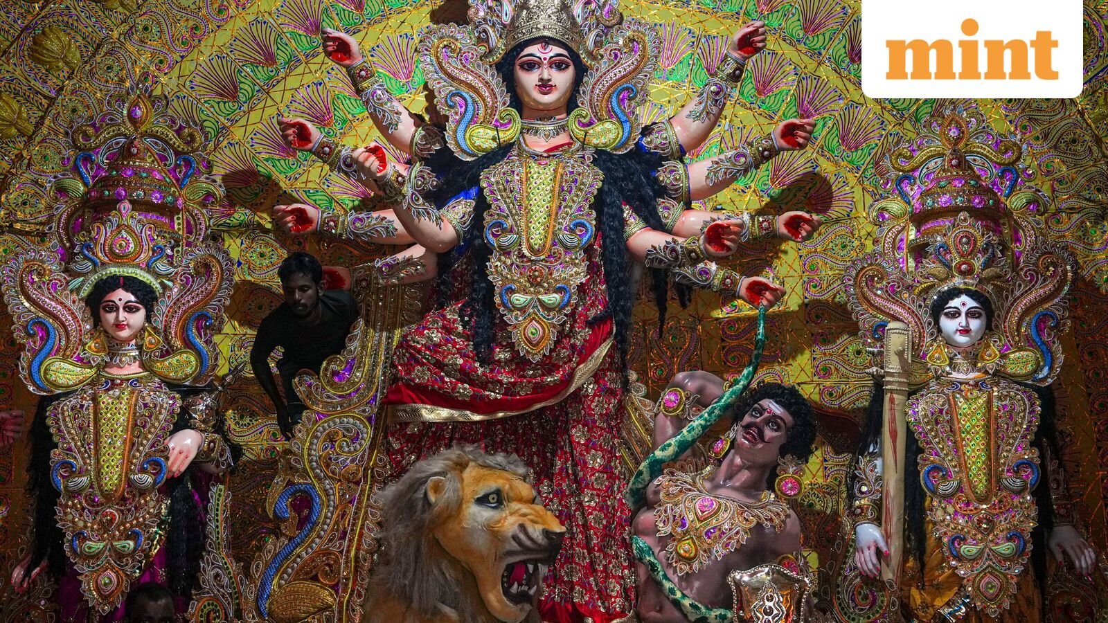 Durga Puja 2025:  A worker decorates a Durga Puja pandal in Kolkata on September 24 ahead of Maha Ashtami and Maha Navami.