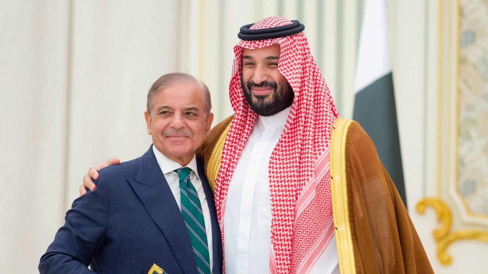 Saudi Crown Prince Mohammed bin Salman and Pakistan Prime Minister Shehbaz Sharif embrace each other on the day they sign a defence agreement, in Riyadh, Saudi Arabia, September 17, 2025.