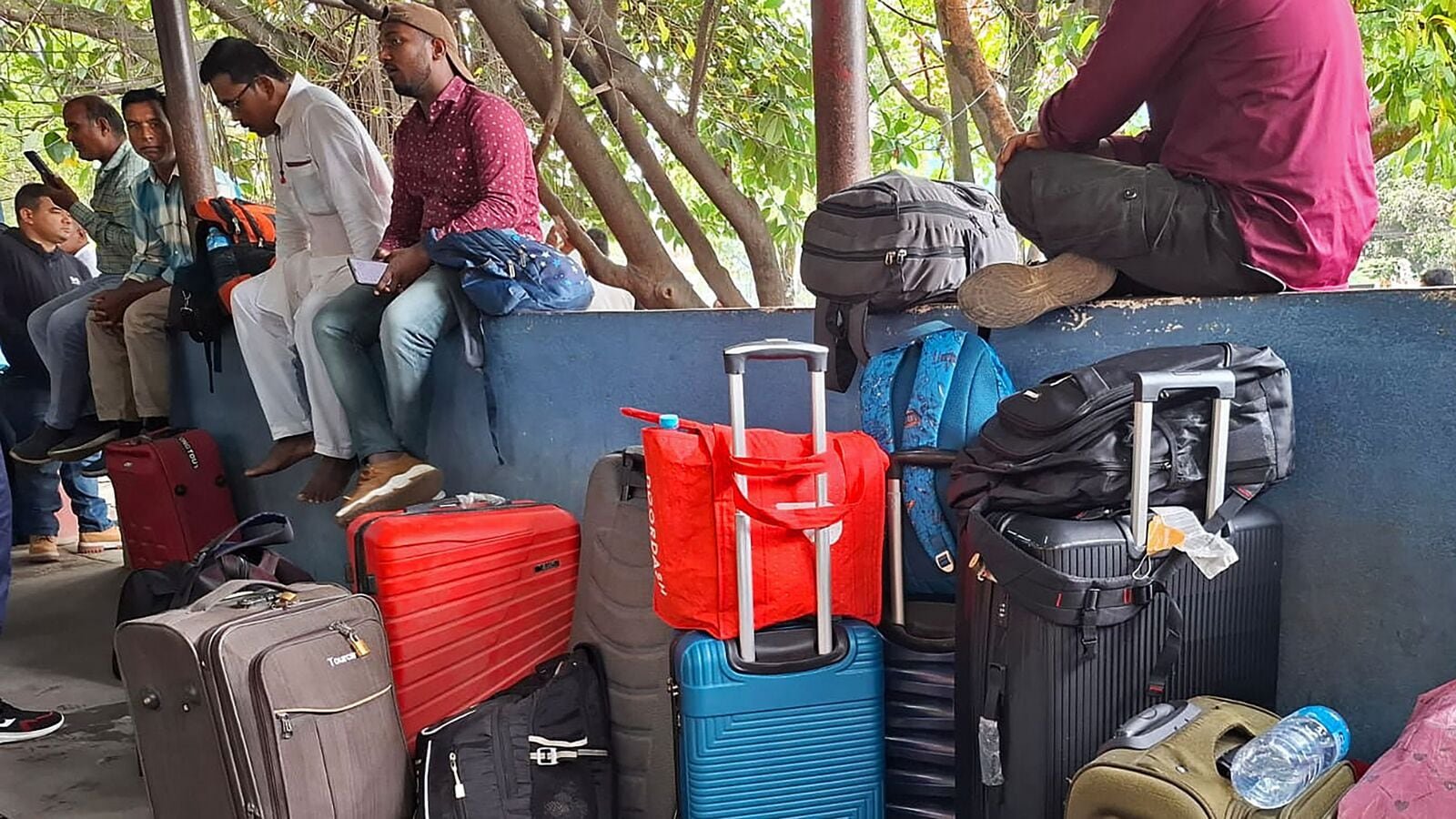 Stranded passengers wait as operations remain halted at the Tribhuvan International airport in Kathmandu on September 10, 2025.
