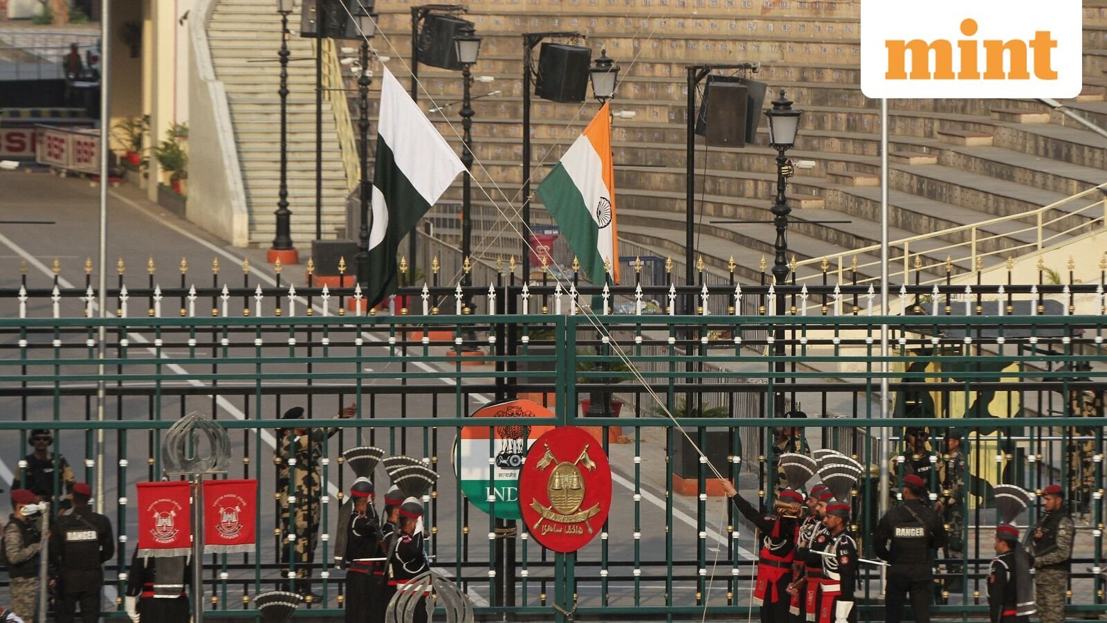 India and Pakistan's rivalry intensifies with competitive, theatrical flag ceremonies at the Wagah border.