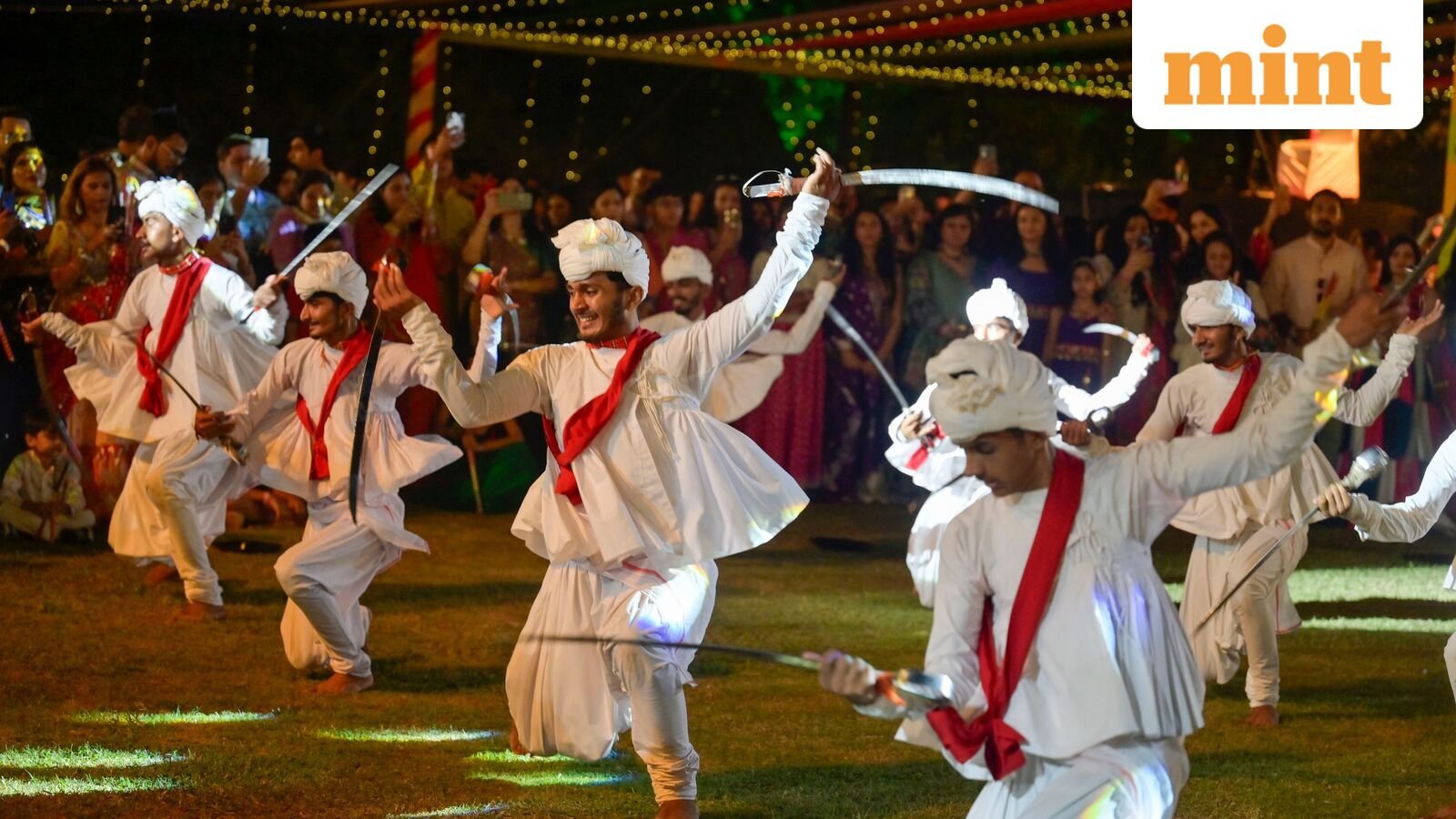 People perform Garba and Dandiya dance during the Durga Navratri festival  celebration.