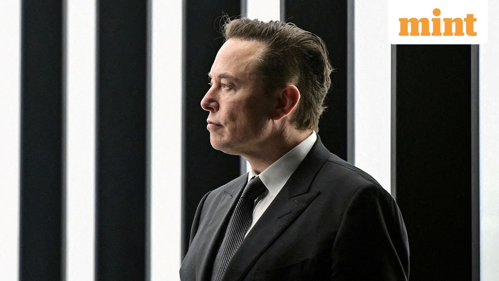 FILE PHOTO: Elon Musk attends the opening ceremony of the new Tesla Gigafactory for electric cars in Gruenheide, Germany, March 22, 2022. Patrick Pleul/Pool via REUTERS/File Photo