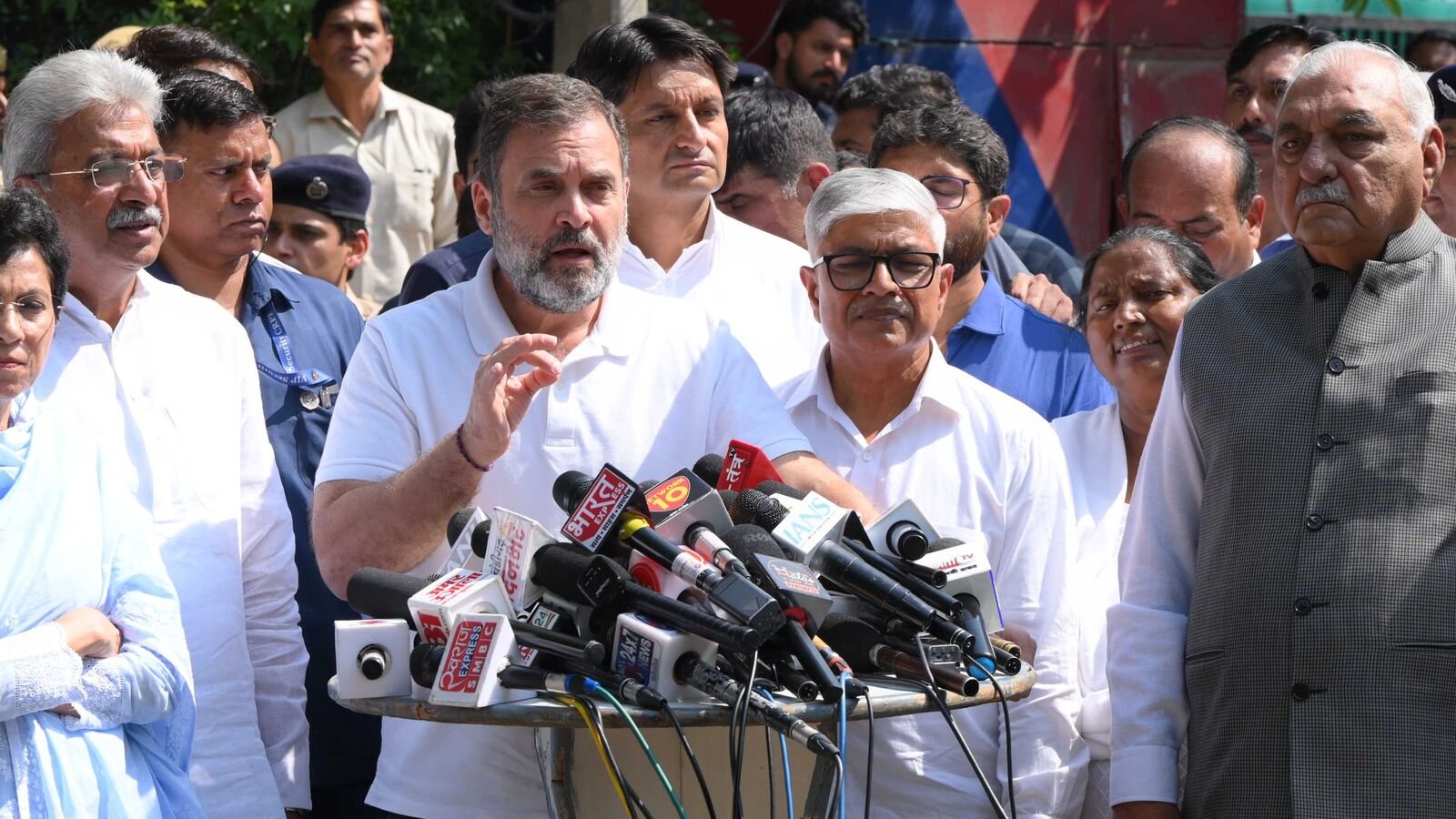 Congress leaders Rahul Gandhi, Kumari Selja, Bhupinder Singh Hooda and Deepender Hooda outside the house of IG Y Puran Kumar in Chandigarh on Tuesday. (Keshav Singh / Hindustan Times)
