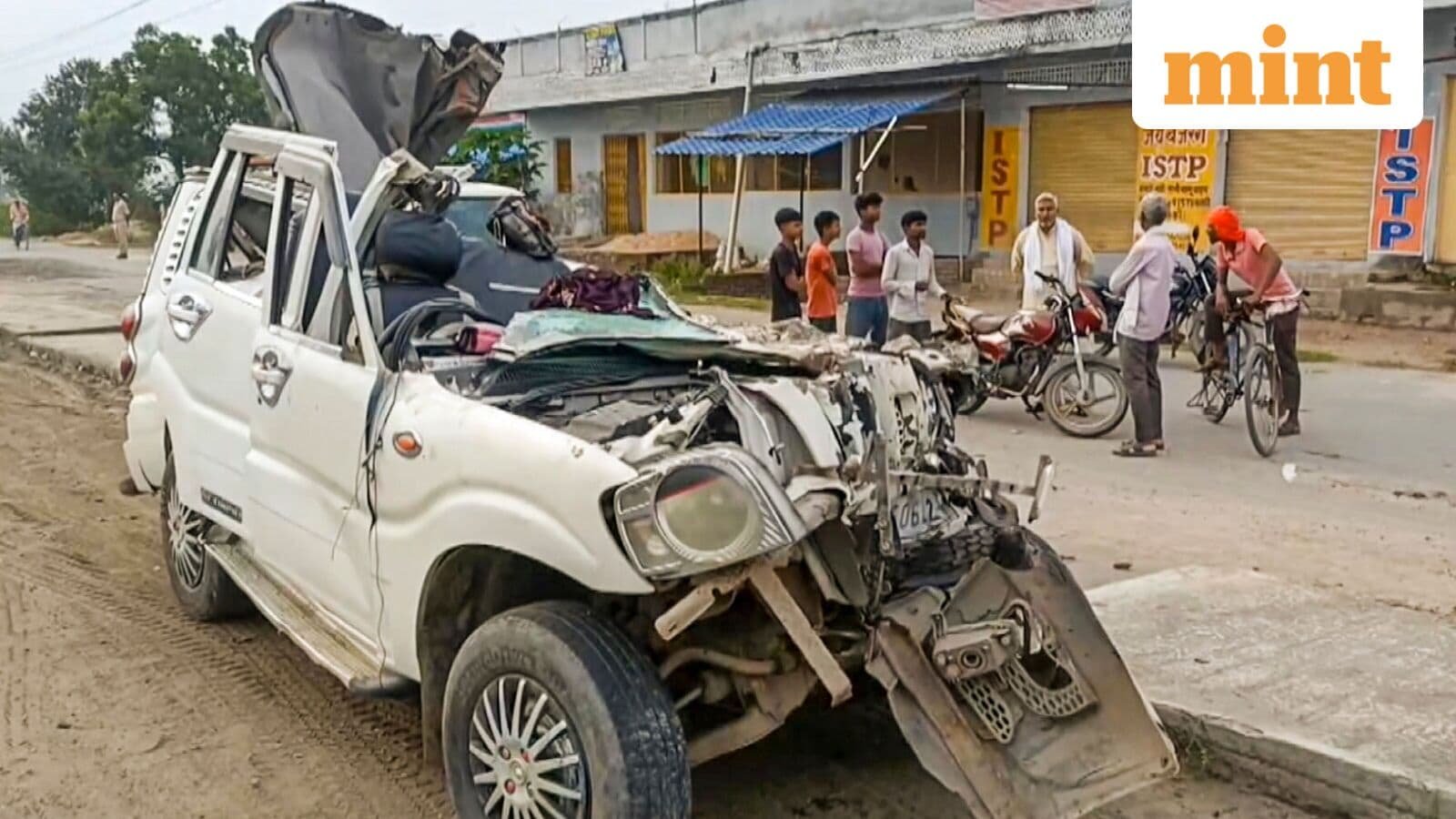 Damaged vehicle after it collides with a parked container near Chhajjupur Pokhre on the national highway, in Kaimur, Thursday, Oct. 2, 2025.