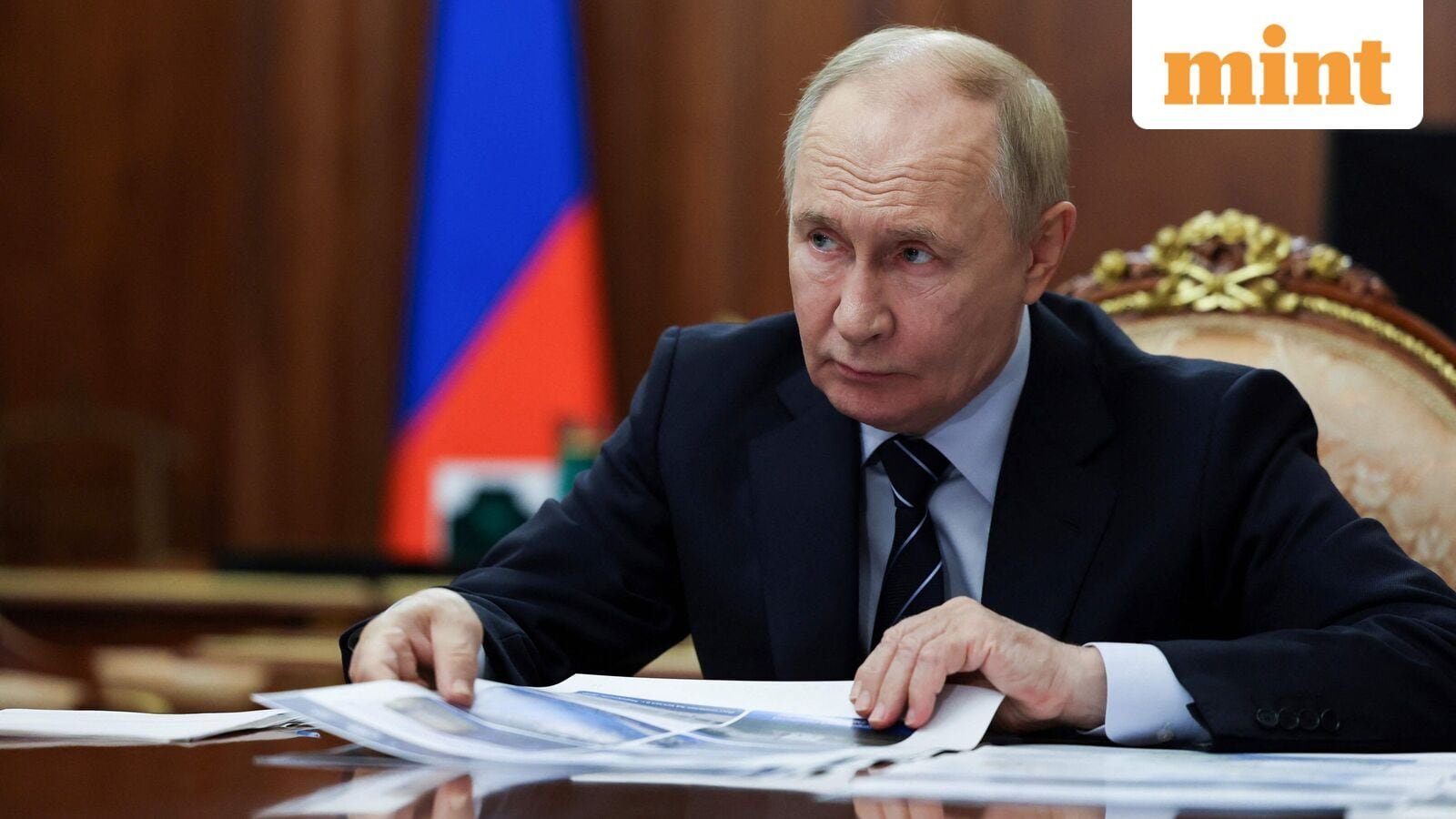 In this pool photograph distributed by the Russian state agency Sputnik, Russia's President Vladimir Putin looks on as he meets Russia's Deputy Prime Minister in Moscow on September 30, 2025. (Photo by Alexander KAZAKOV / POOL / AFP)