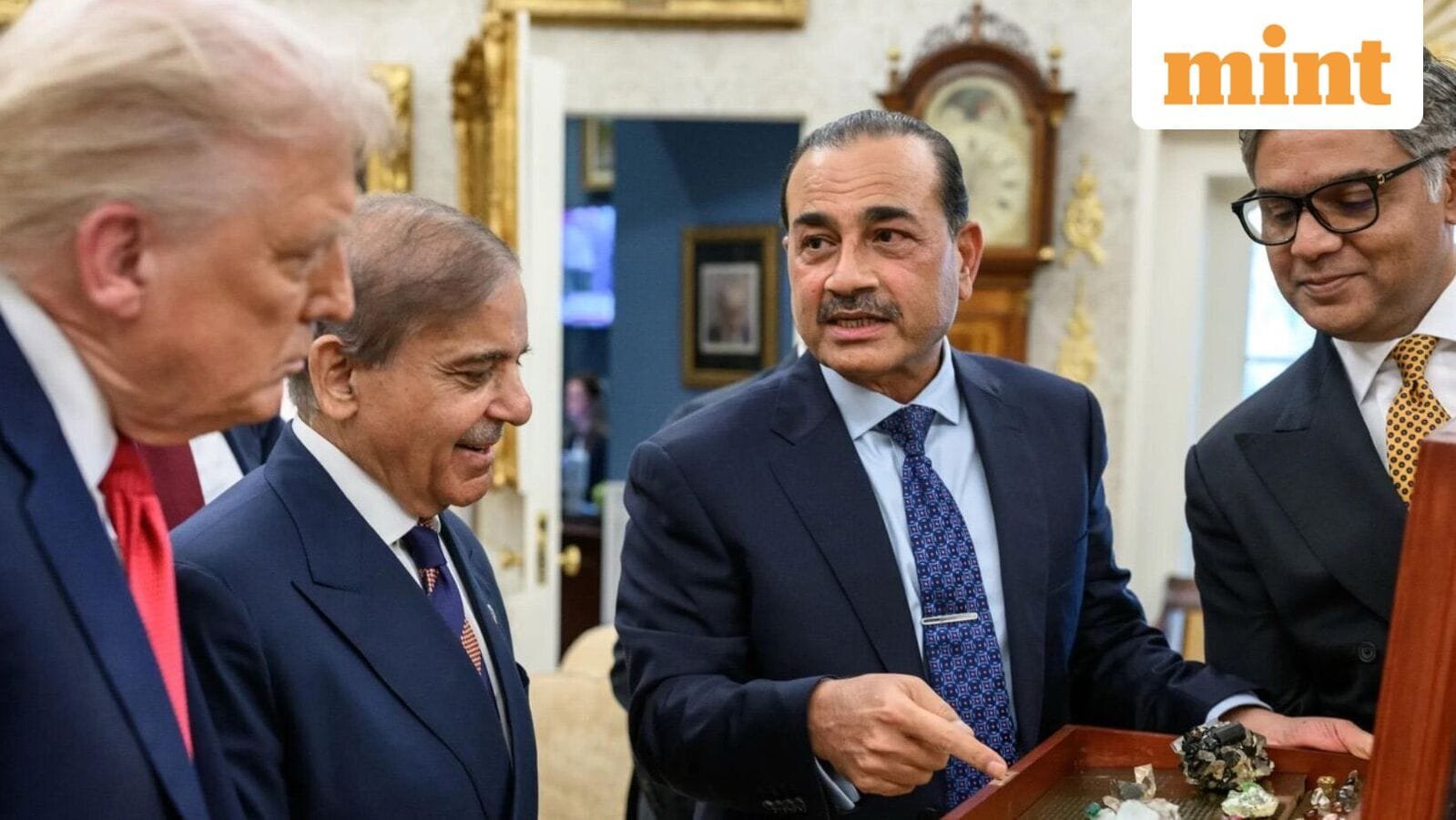 A White House photo showing Pakistan PM Shehbaz Sharif and Field Marshal Asim Munir showcasing rare earth minerals to US President Donald Trump.