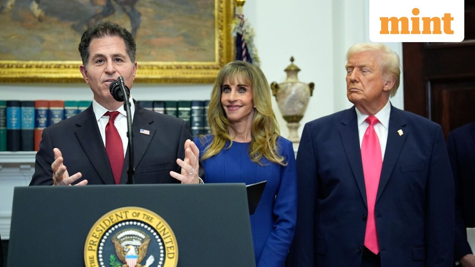 Michael Dell, chairman and chief executive officer of Dell Inc., from left, his wife Susan Dell, and US President Donald Trump during an announcement on 'Trump Accounts' for children in the Roosevelt Room of the White House in Washington, DC, US, on Tuesday. The $6.25 billion gift from Michael and Susan Dell will go to the Treasury Department and will fund accounts for an additional 25 million children 10 and under who aren't already eligible for the government money.